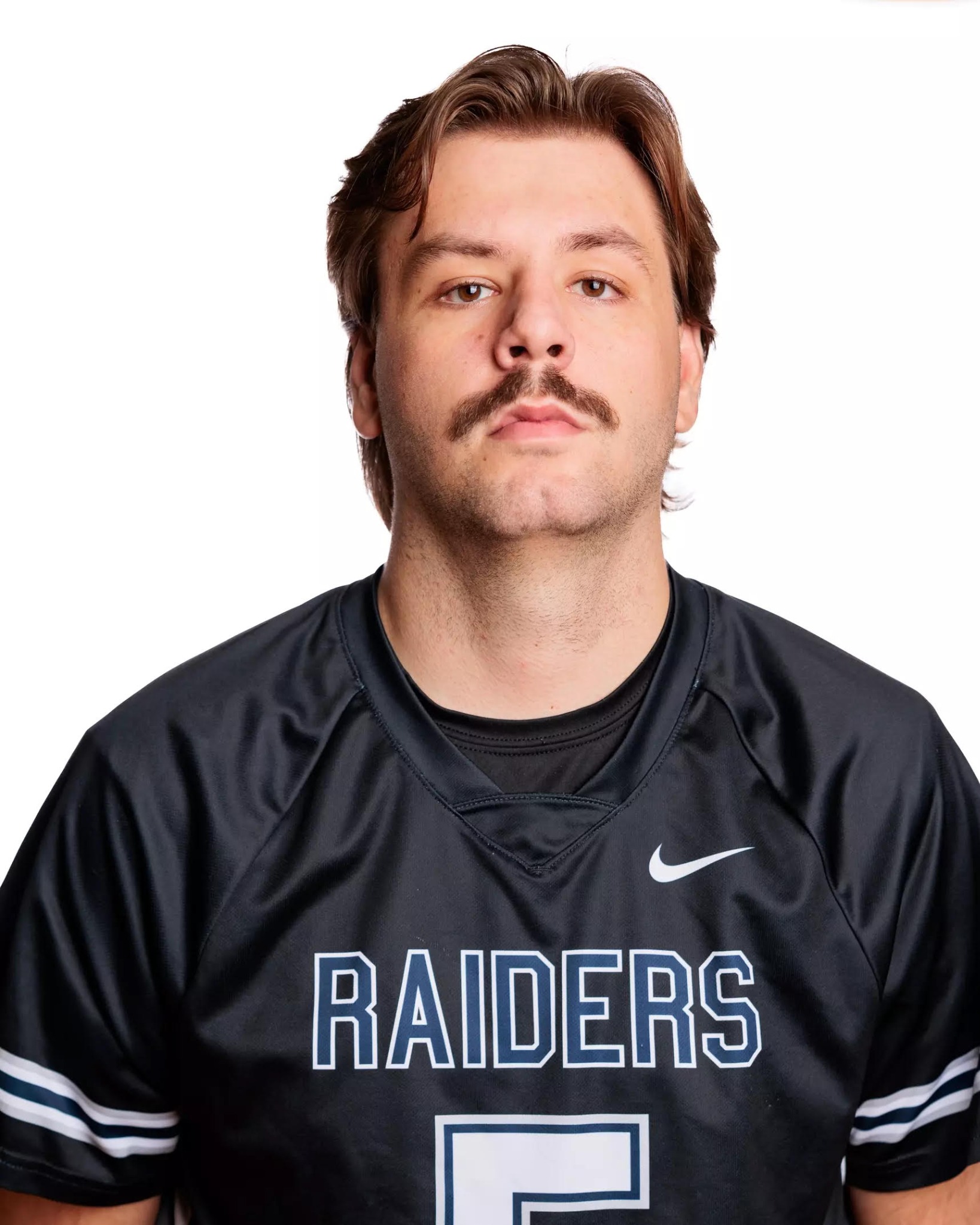 Kyle Such in his Post University lacrosse jersey